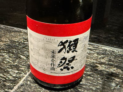 獺祭 未来を作曲の楽譜を刷ったラベル