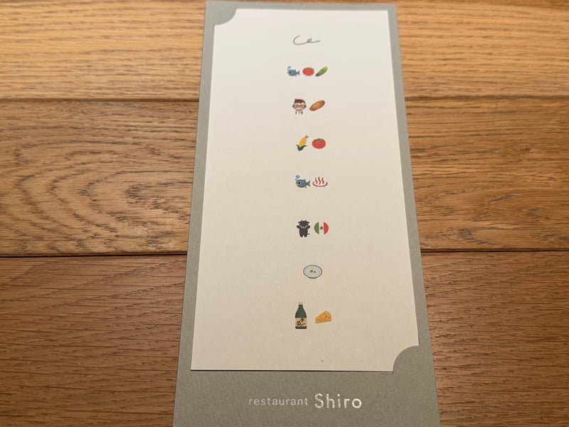 restaurant Shiro の献立カード。品名はなく、料理を表す絵文字が縦に8行並ぶ