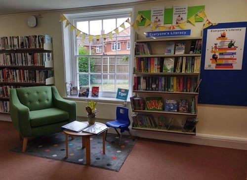 Frinton Library's Literacy area Chair and a Bookshelf