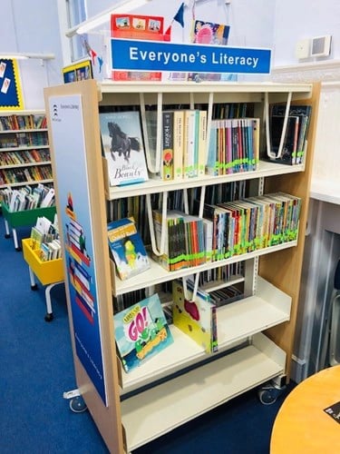 Earls Colne Library's Literacy area Bookshelves and table