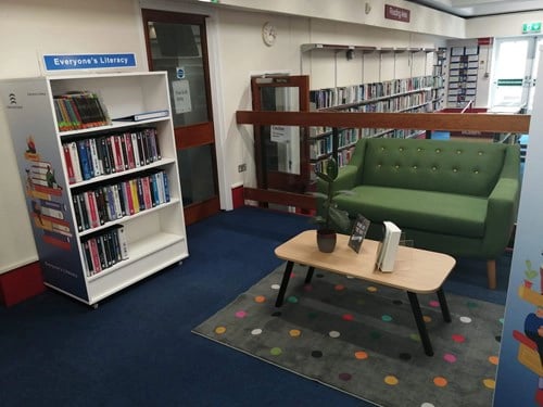 Witham Library's Literacy Area sofa and bookcase