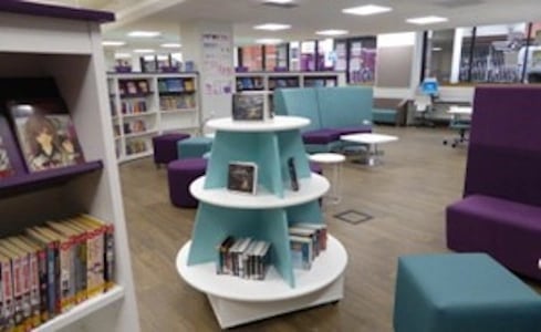 library book shelves and seating area