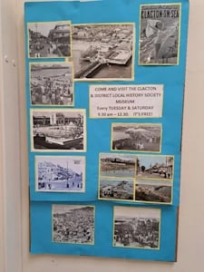 museum display board with photos
