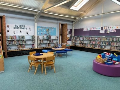Desk and chairs in library