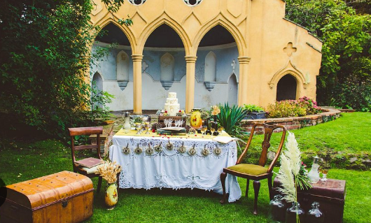 Photograph of the Minories Garden in Colchester featuring a table full of crafts and toys