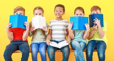 Image showing some children sitting with books