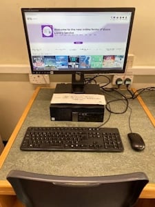 Library catalogue machine on desk