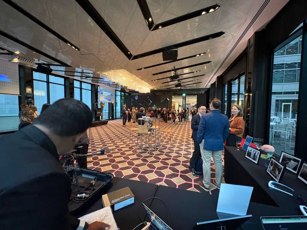 Networking event with drone case and Jetson Orin Nano display on a table