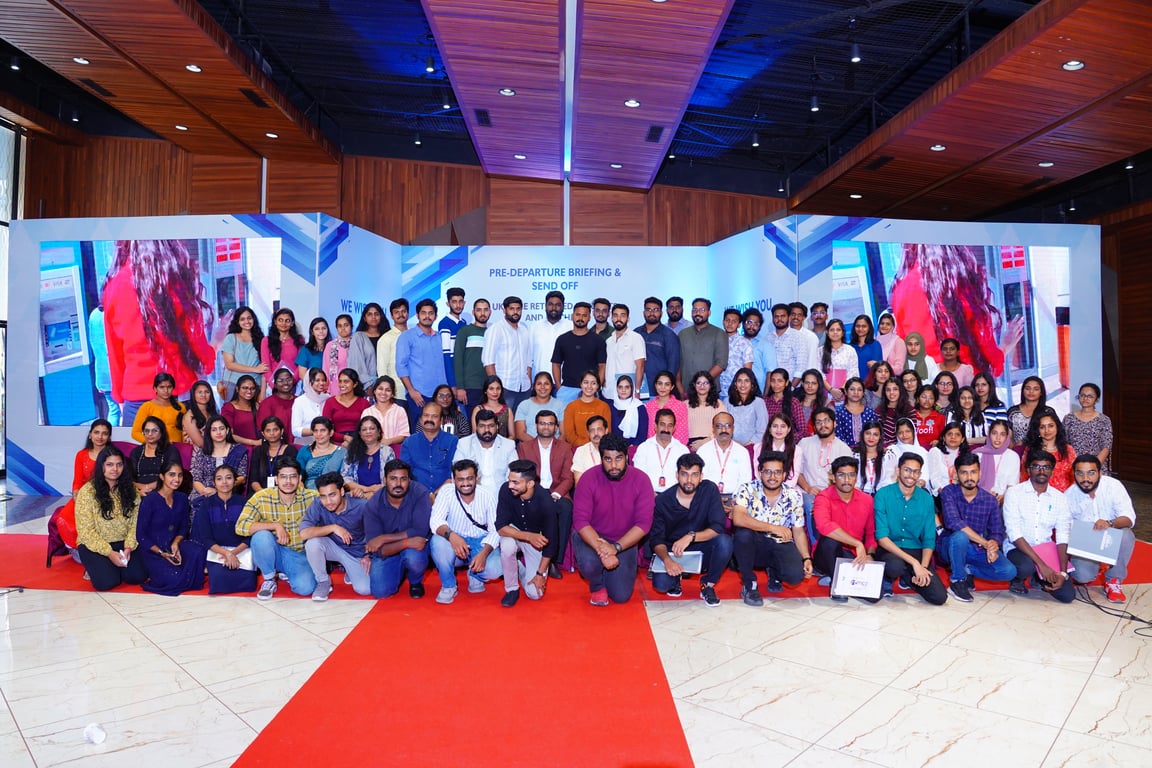 Students and parents with Meera
