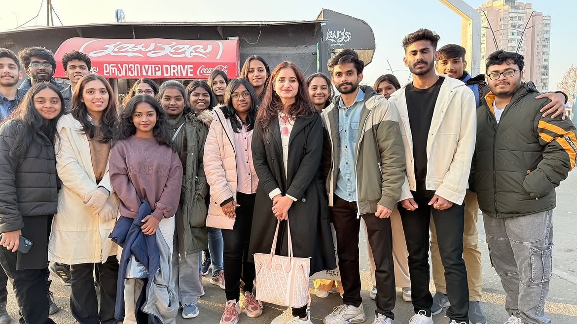 Meera with students and parents
