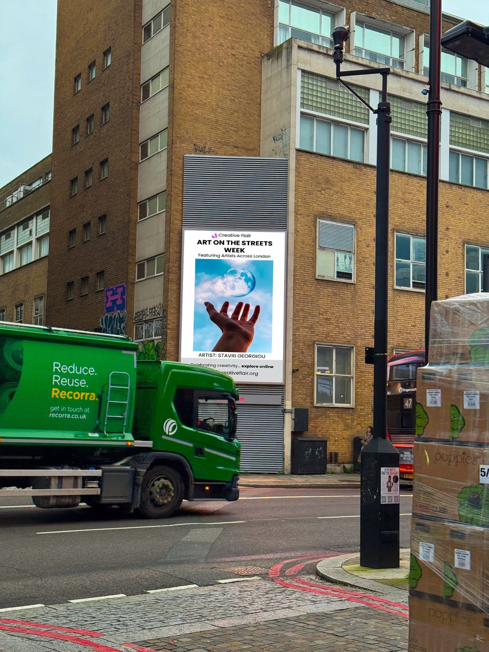 Stavri Georgiou The Impossible artwork on London billboard at dusk - billboard art exhibition