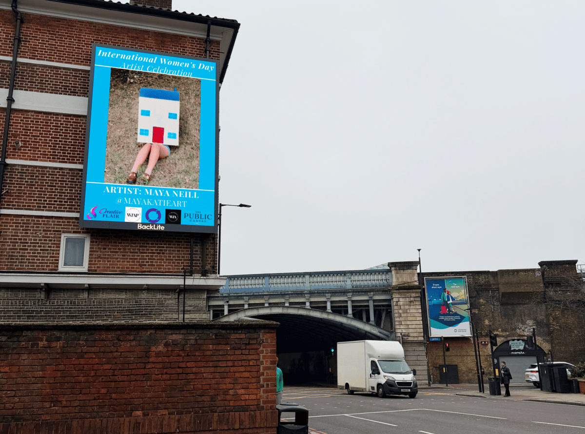 Artist work on a London billboard