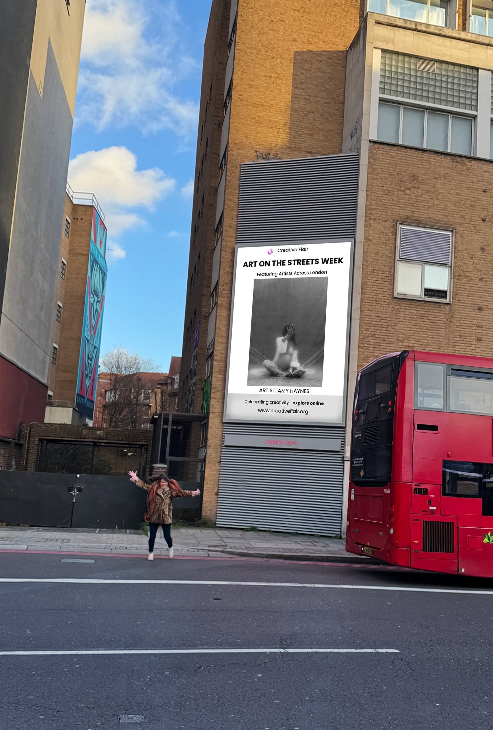 Amy Haynes posing in front of her billboard art in London - Art On The Streets artist billboard exhibition with red double-decker bus