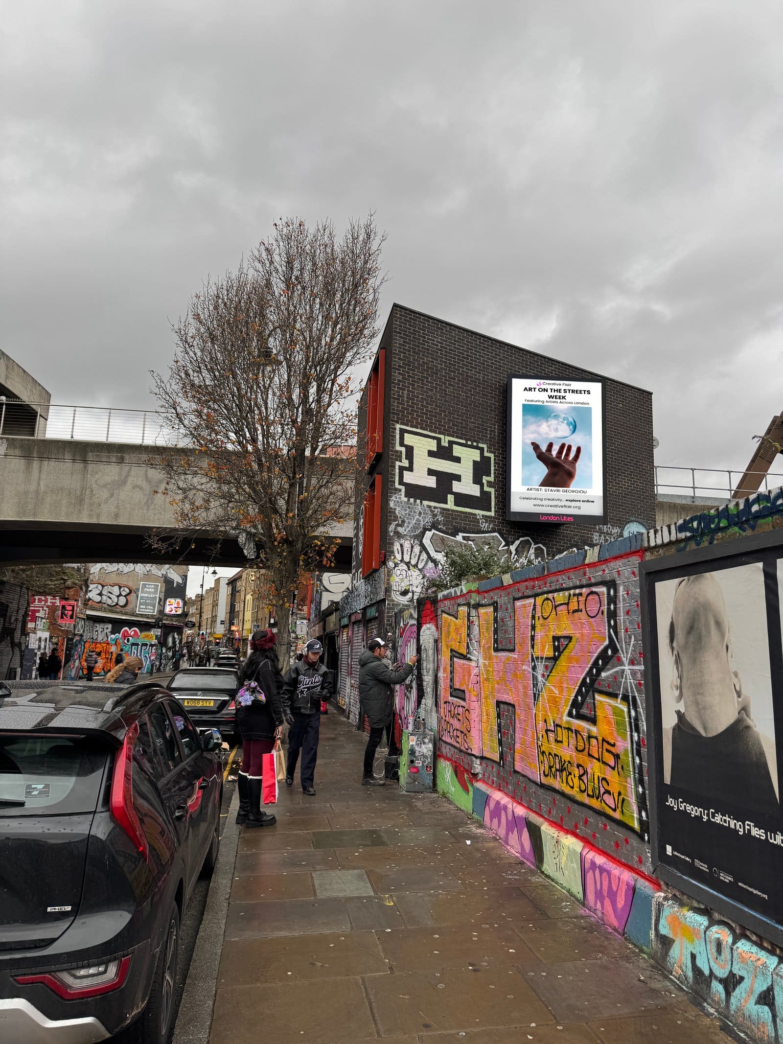 Stavri Georgiou artwork on a real London billboard near Shoreditch street art - Art On The Streets billboard art residency