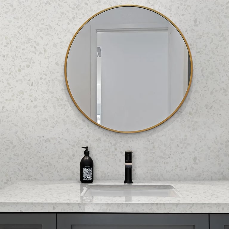 Iceberg Agglomerate Marble on feature wall and vanity in bathroom.