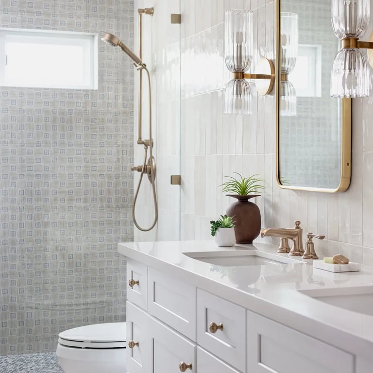 Cotton Quartz (countertop), Flash White 3 x 12 (backsplash) & Cementine Evo 3 - 8 x 8 (shower wall)