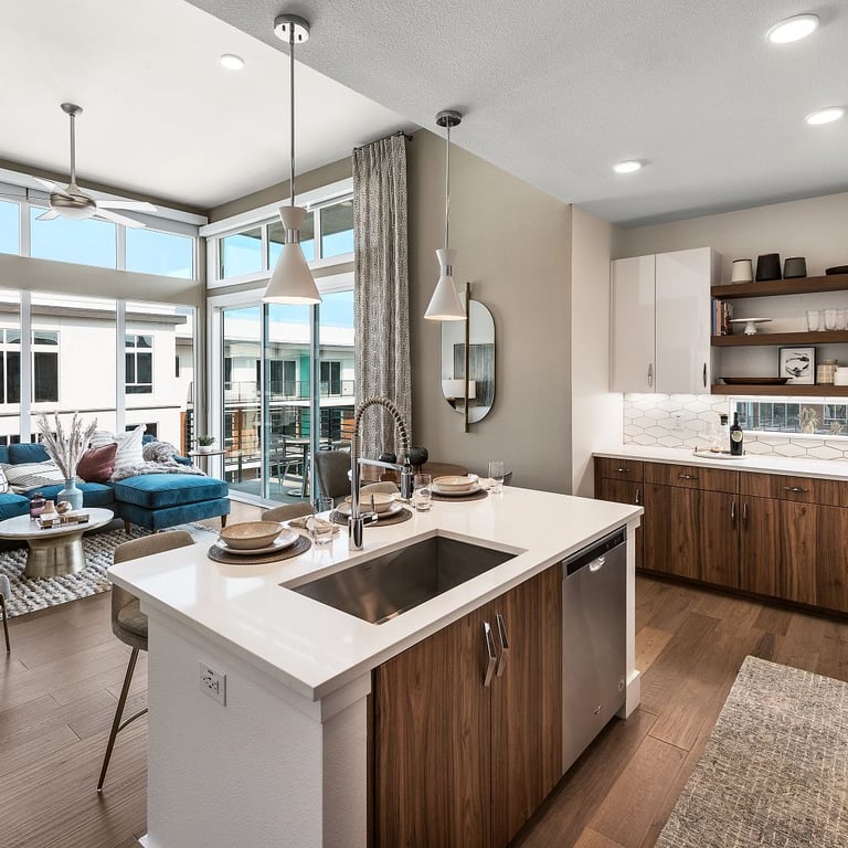 Denali-N quartz counters and Paloma Cotton Glossy Long Hex backsplash in kitchen