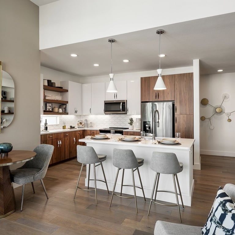 Denali-N quartz counters and Paloma Cotton Glossy Long Hex backsplash in kitchen