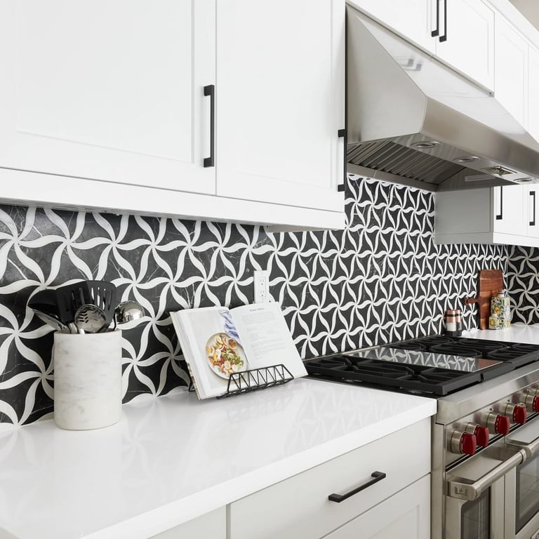 Denali-N Quartz on counters & Petal Noir/Blanc Honed Marble Mesh on backsplash in kitchen.