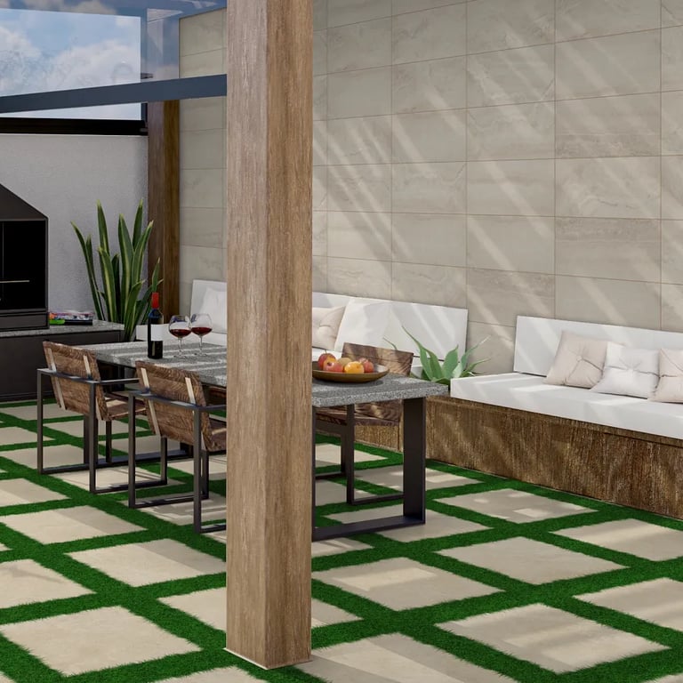 Azul Platino granite on patio table), Trav Sand Matte 12 x 24 porcelain tile on wall & Borgo Caldo 2cm 24 x 24 pavers on patio floor in outdoor private dining area in restaurant.