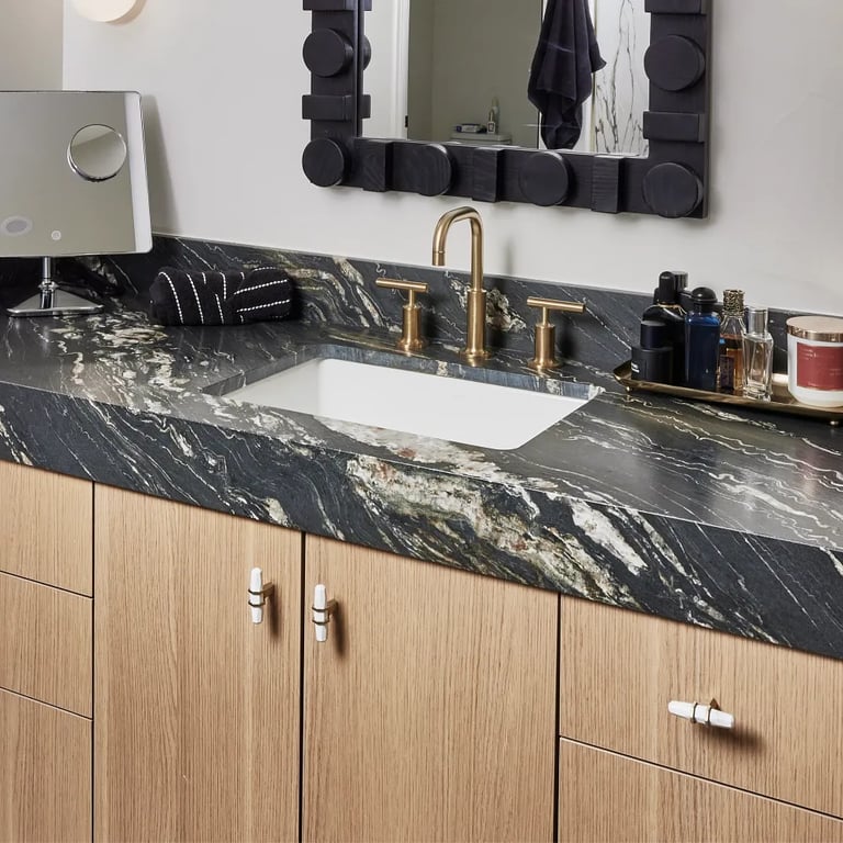 Belvedere Polished granite on countertop of vanity in master bathroom.