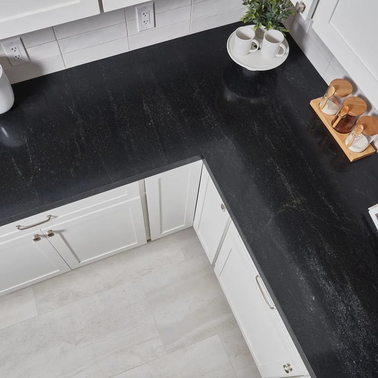 Black Mist Honed Granite (countertop), Flash White 3 x 12 (backsplash) & Tivoli Bianco 18 x 36 (floor)