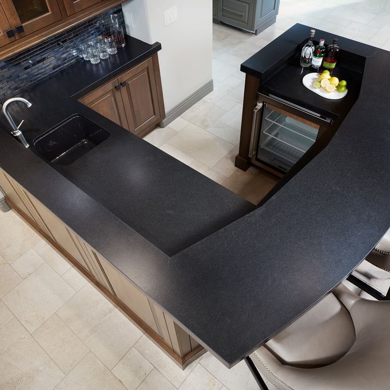 Indian Premium Black Satin (bar top) Crema Vosscione Brushed Lyon Pattern (floor)