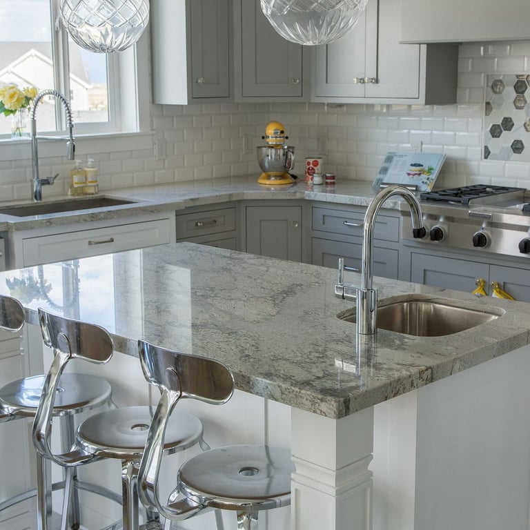 River White Granite (countertop) Paloma Cotton Glossy Bevel 3 x 6 (backsplash)