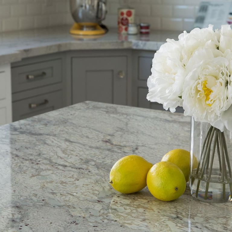 River White Granite (countertop) Paloma Cotton Glossy Bevel 3 x 6 (backsplash)