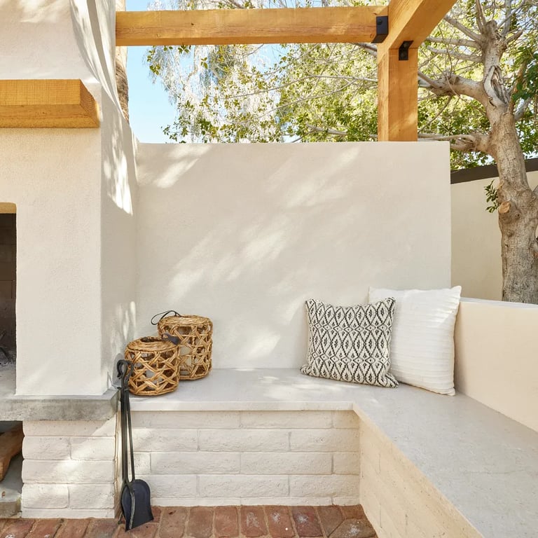 Crema Vosscione Honed Limestone slab seating area in outdoor patio.