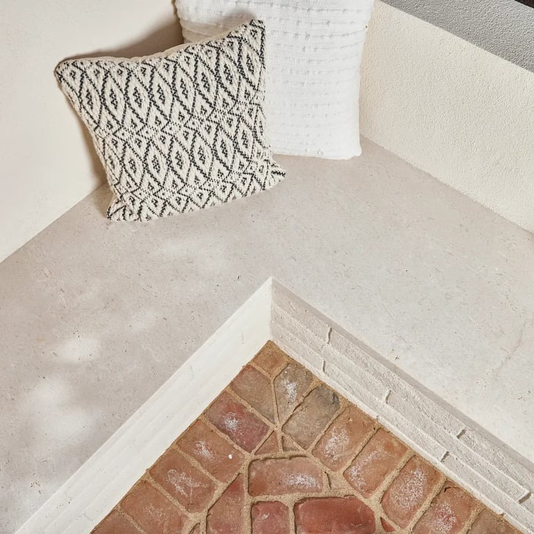 Crema Vosscione Honed Limestone slab bench seating area in outdoor patio.