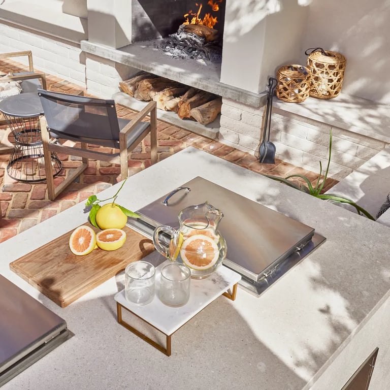 Crema Vosscione Honed Limestone countertop in outdoor kitchen/patio.