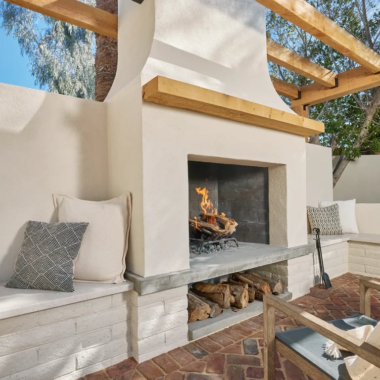 Crema Vosscione Honed Limestone slab seating area in outdoor patio.