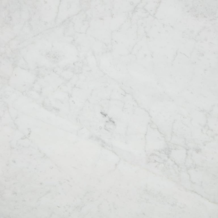 Bianco Carrara Honed – Close up photo is an example of the structure and color of this product, which will vary.