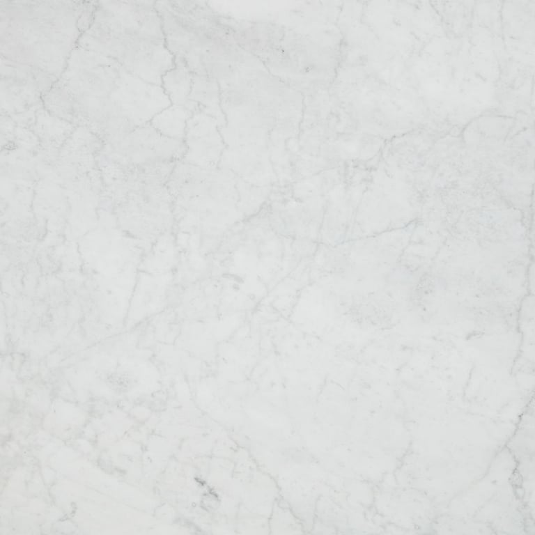 Bianco Carrara Honed – Close up photo is an example of the structure and color of this product, which will vary.