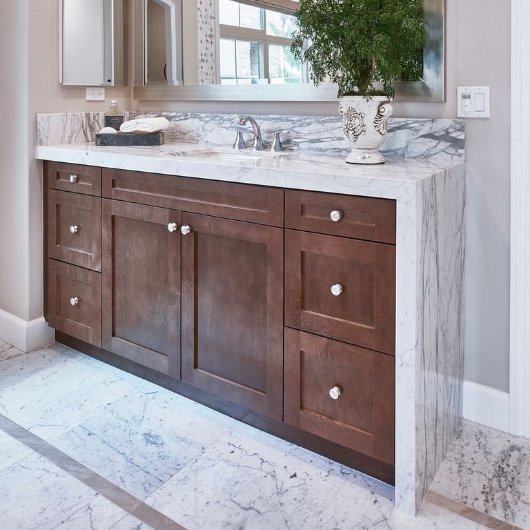 Bianco Venatino Honed (counters) & 12 x 24 (floor)