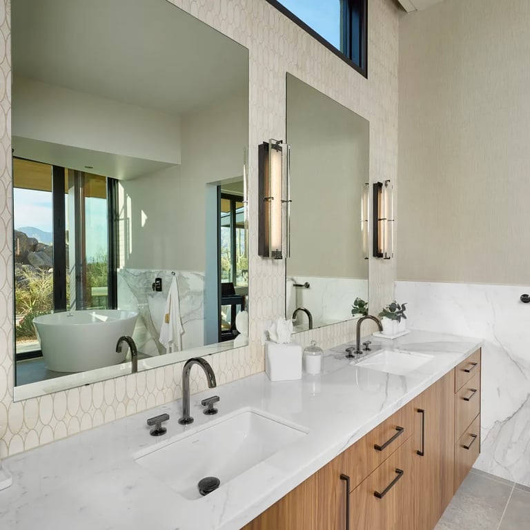 Calacatta Betogli Extra Polished (vanity/wall), CS-Terra Nova Honed Oval Mesh (backsplash) & Anthea Earth 24 x 48 (floor)