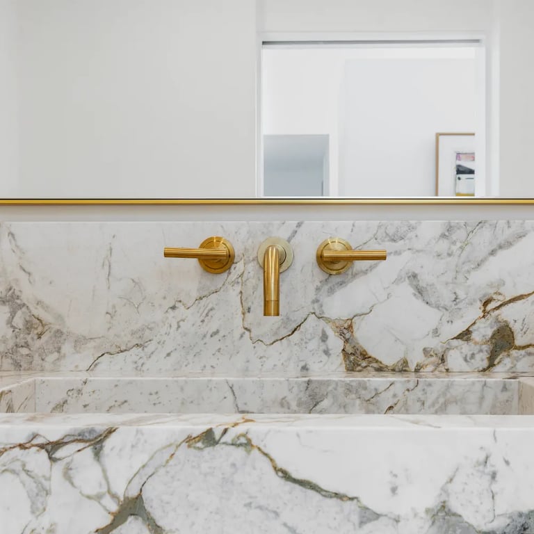 Calacatta Capixaba Marble vanity in restroom