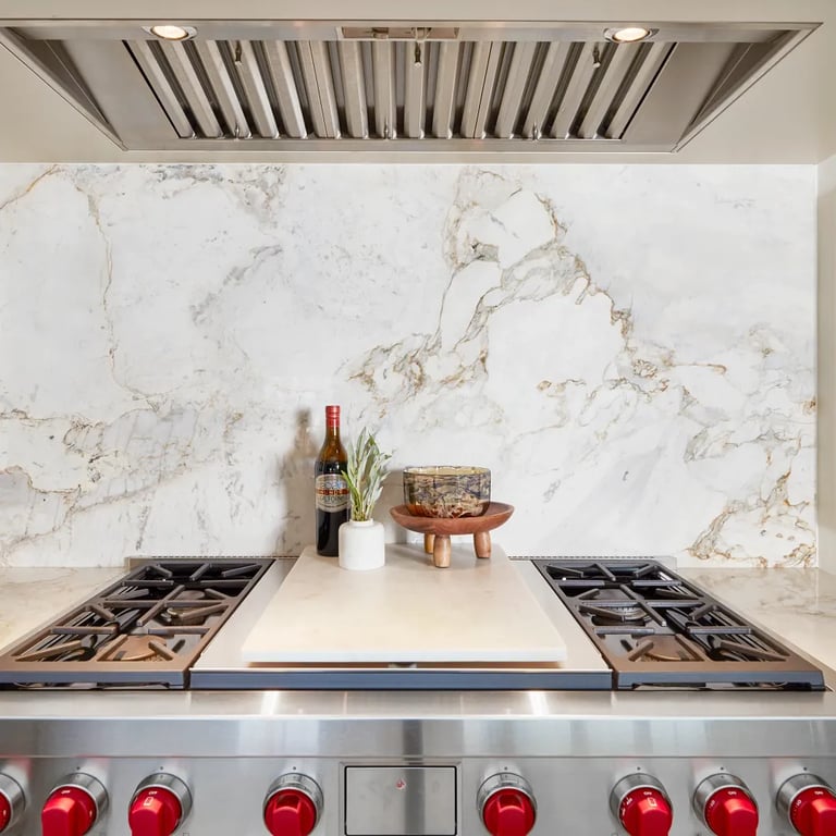 Calacatta Capixaba Marble on backsplash and counters in kitchen