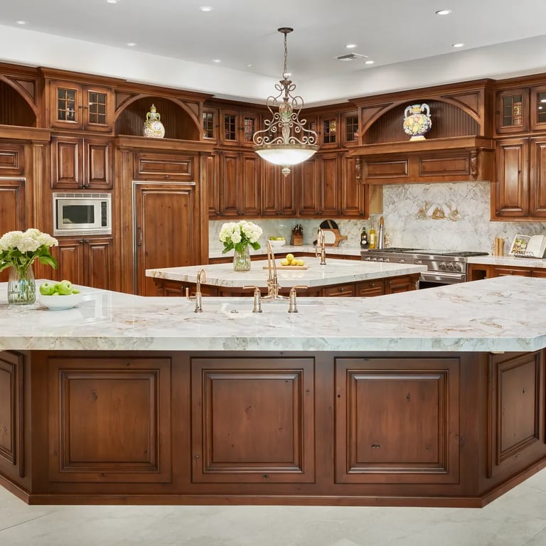 Calacatta Capixaba (island/counters/backsplash) & Anthea White 24 x 48 (floor)