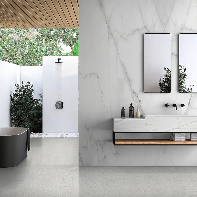 Classico 24 x 24 agglomerate marble tile floor & Calacatta Lincoln Satin Marble on wall & vanity in master bathroom.