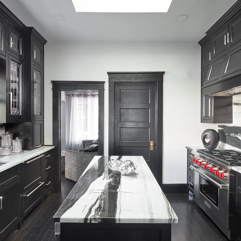 Fantasy Zebra Polished marble on kitchen island, backsplash, and counters in kitchen.