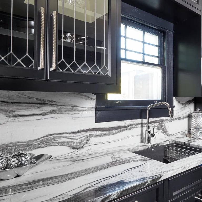 Fantasy Zebra Polished marble on backsplash and counters in kitchen.
