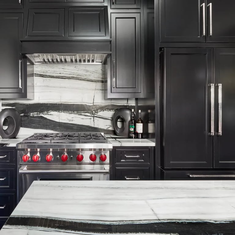 Fantasy Zebra Polished marble on kitchen island, backsplash, and counters in kitchen.