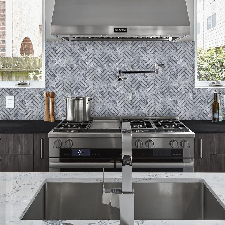 Artemis Polished (island), Black Mist Honed (counter) & CS D Blue Honed Herringbone 1 x 4 (backsplash)
