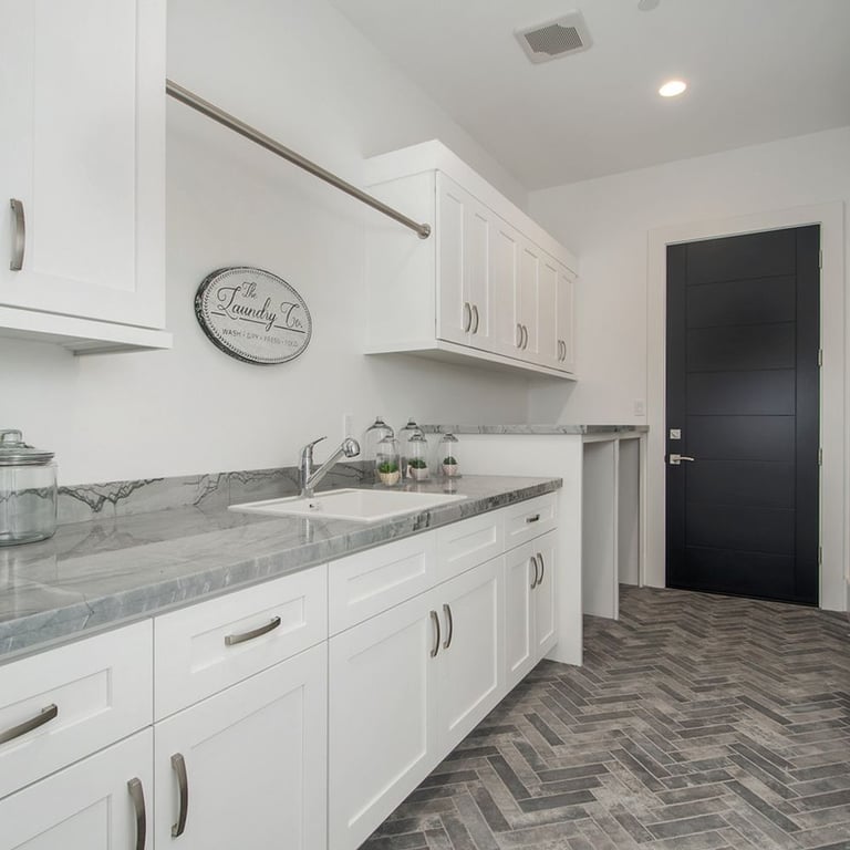 Artemis Polished (counter) & Castle Brick Grey (floor)