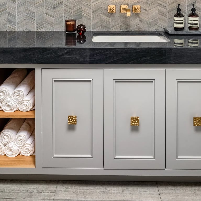 Brilliant Black quartzite on countertop vanity in bathroom.