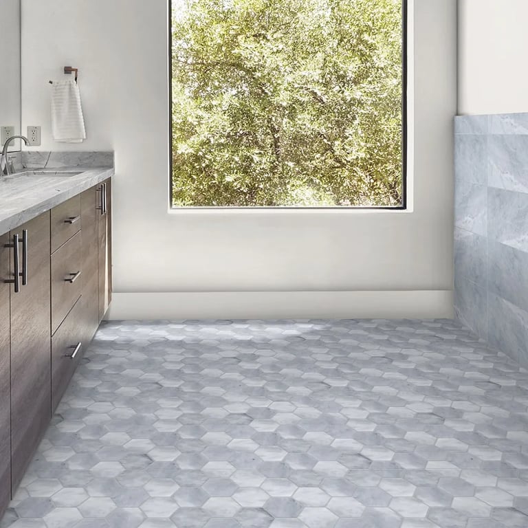 Ijen Blue Polished Quartzite (counter), CS-Sky Blue Honed Hex 4 Inch Marble (floor )& Sky Blue Honed 12 x 24 Marble (wall) in bathroom.