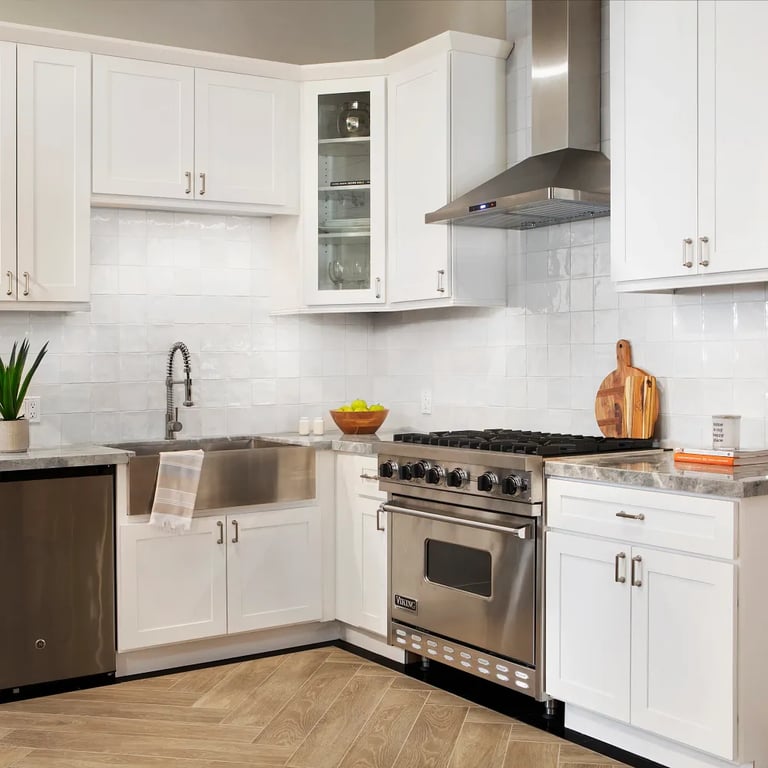 Ijen Blue Polished Quartzite (counter) & Flash White 5 x 5 Ceramic Wall Tile (backsplash) in kitchen.