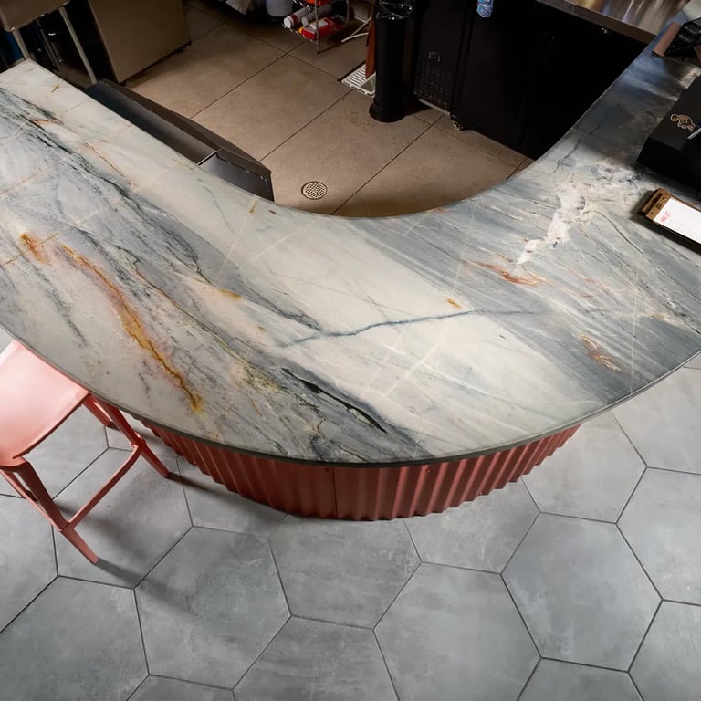 Ijen Blue Polished (bar top) & Icon Smoke Matte Hex 20 x 24 (floor)